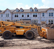 Workers Build a Housing Complex Ahead of Construction Spending Data